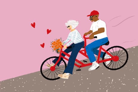 An illustration of an older man and woman riding a red tandem bike down a hill